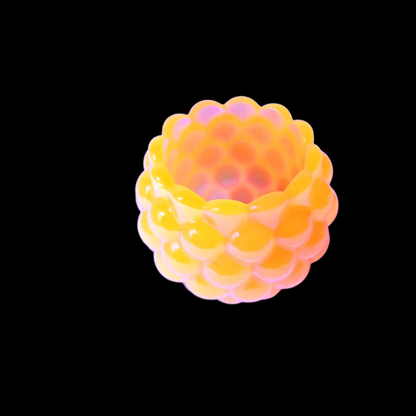 Photo showing the neon orange handmade resin scalloped bowl fluorescing under a UV light.