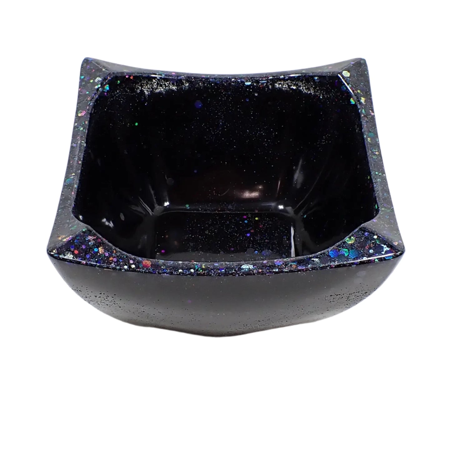 Angled top view of the black glitter angled bowl showing more of the opening of the bowl and the inside bottom area.