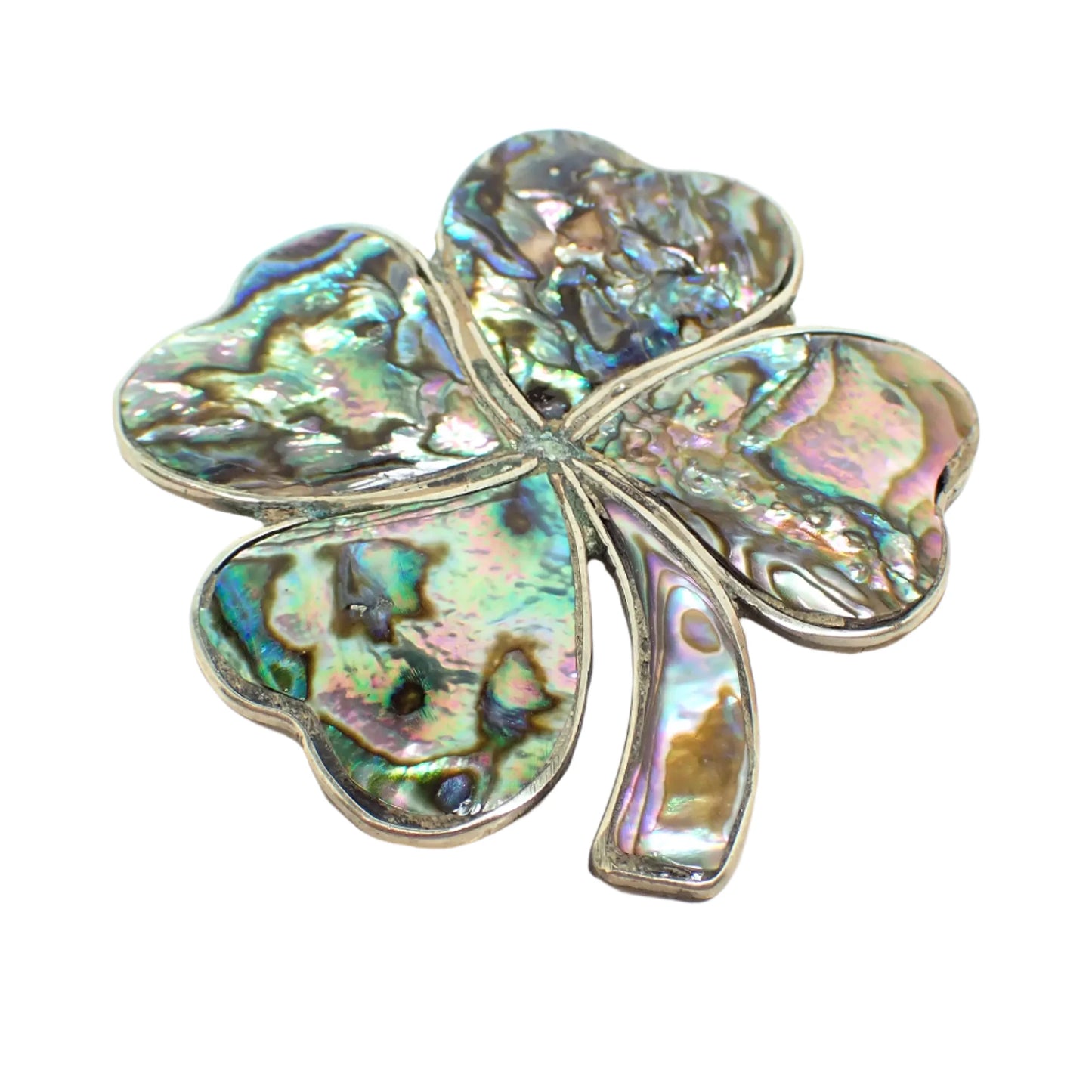 Angled view of the brooch showing the stem better and the iridescent flash of colors on the piece.