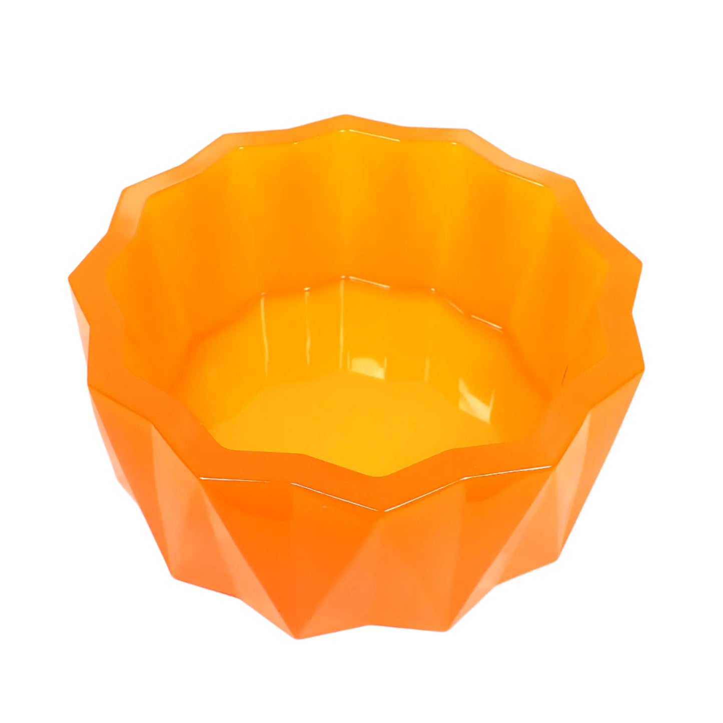 Top view of the large handmade neon orange resin decorative bowl showing the inside area where objects could be placed and the faceted sun like design on the top edge.