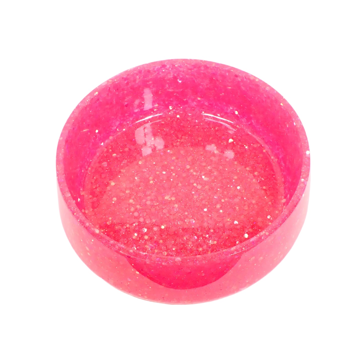 Top view of the large handmade pink glitter resin decorative bowl showing the inside area where items could be placed. The iridescent chunky pink glitter is throughout the piece.
