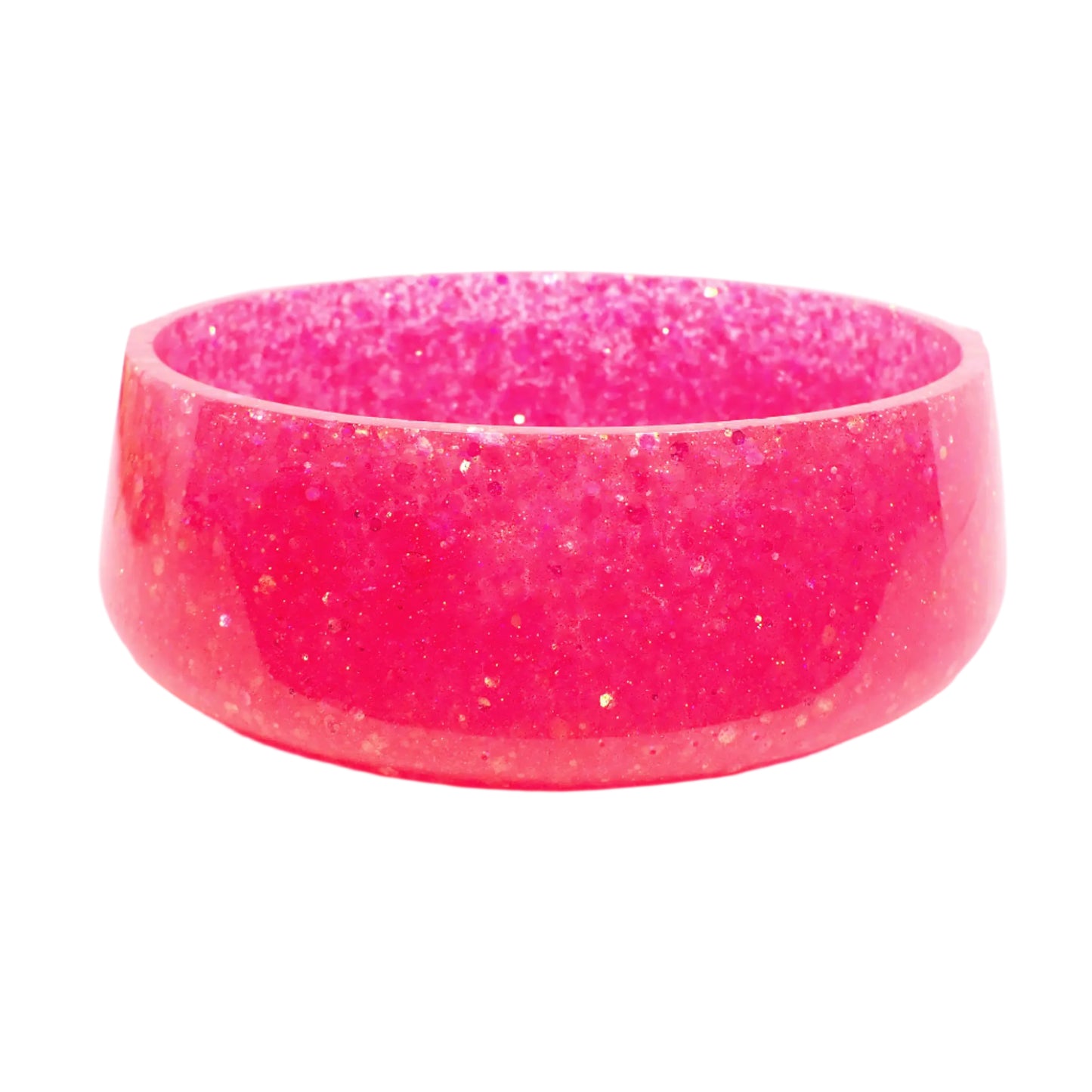 Side view of the large handmade pink glitter resin decorative bowl. It is round with a slightly flared bottom. There is iridescent chunky pink glitter throughout.