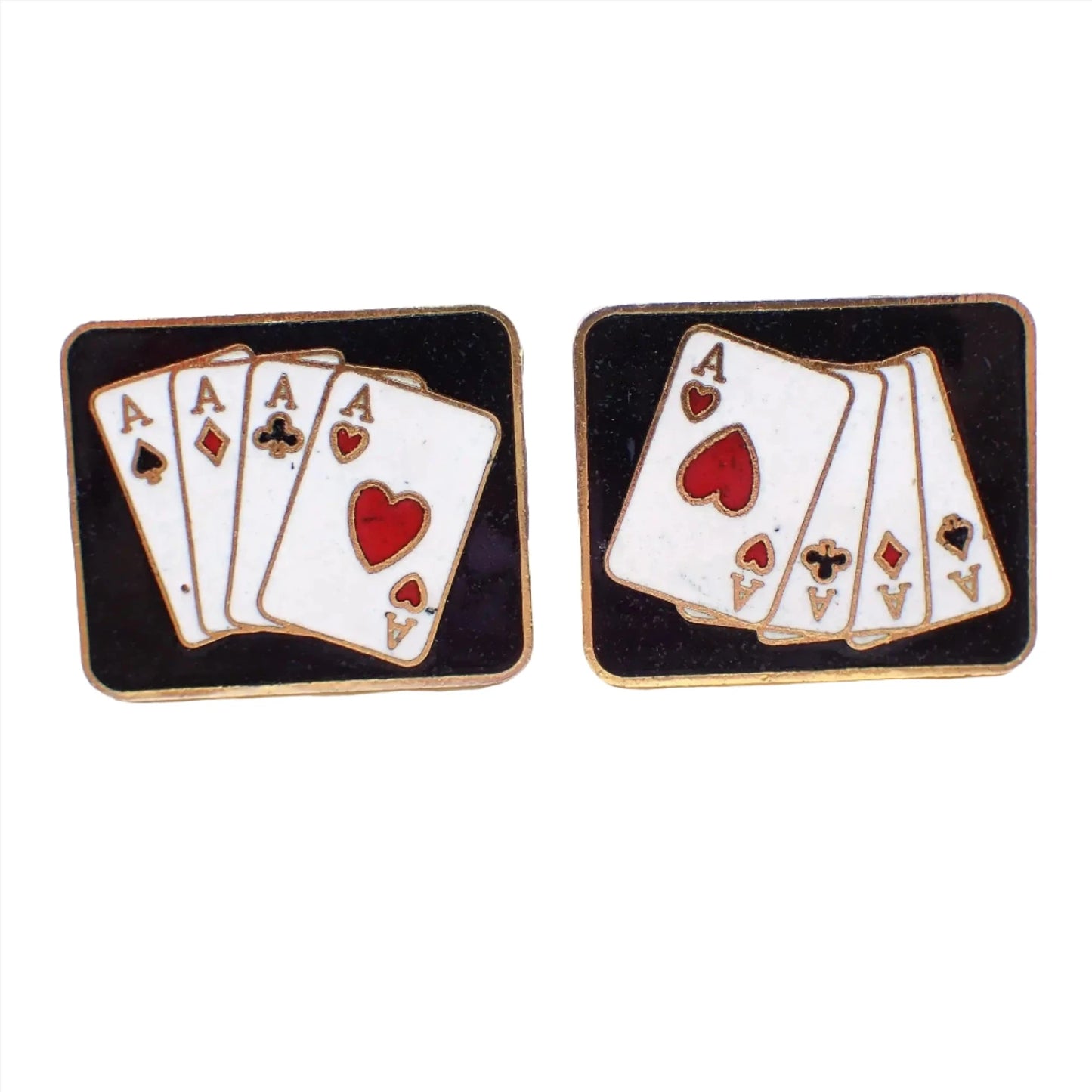 Front view of the retro vintage playing card cufflinks. They are rectangular in shape with gold tone color metal. The fronts have black enamel with white, black, and red playing card design showing a 4 of a kind Poker hand with Aces.