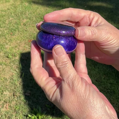 Small Pearly Purple and Blue Resin Handmade Round Trinket Box with Chunky Iridescent Glitter video showing how the glitter sparkles in the light.
