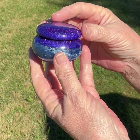 Small Pearly Blue Round Handmade Resin Trinket Box with Purple Chunky Iridescent Glitter video showing how the glitter sparkles in the light.