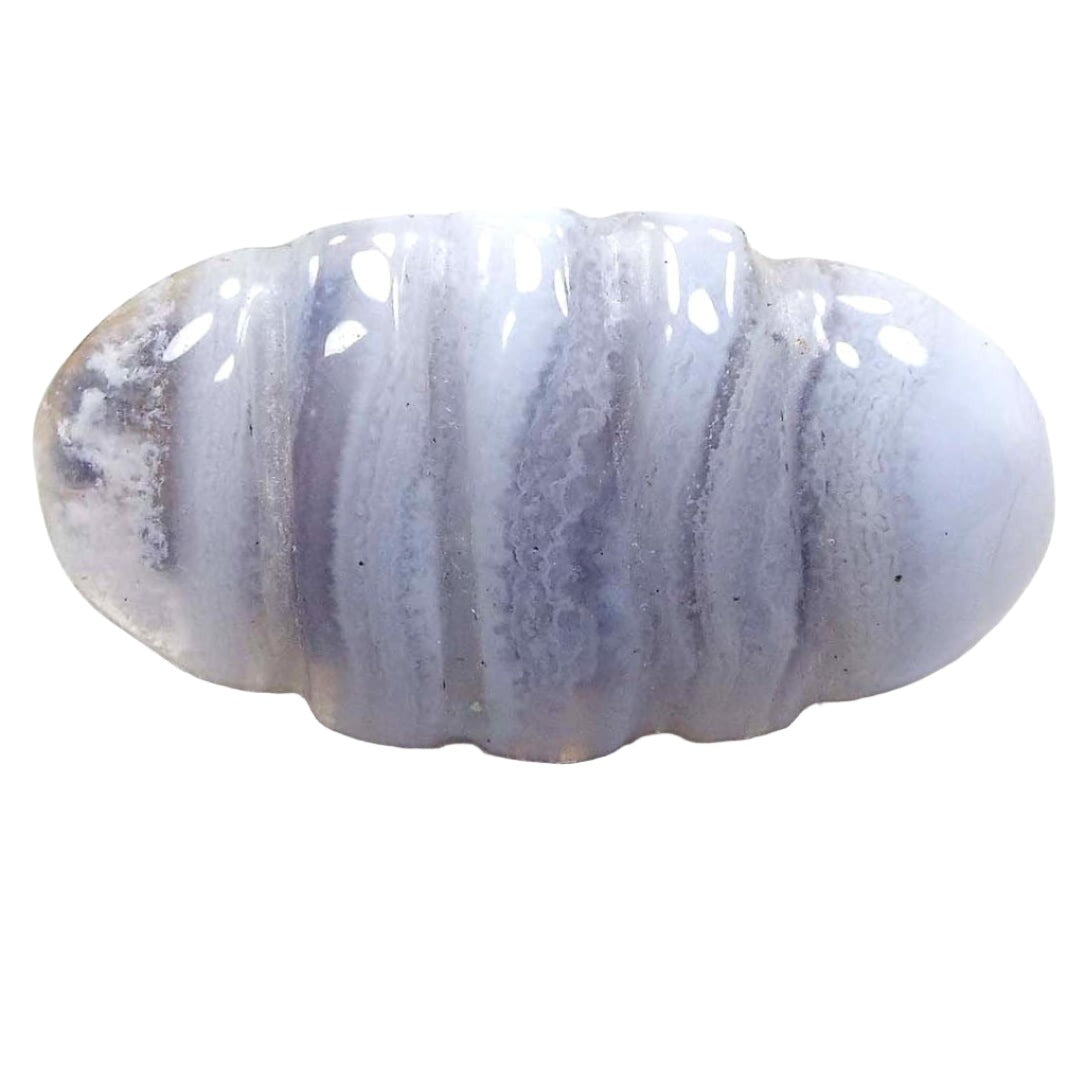 Front view of the retro vintage glass scarf ring. It has a scalloped oval shape and has striping with light periwinkle blue and really light purple bands with a bit of clear on the end.