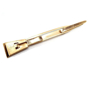 Front view of the 1950's Mid Century vintage Swank initial tie bar. It is gold tone in color and has a block letter E on one end and a point on the other end. The middle is open to slide the tie into.