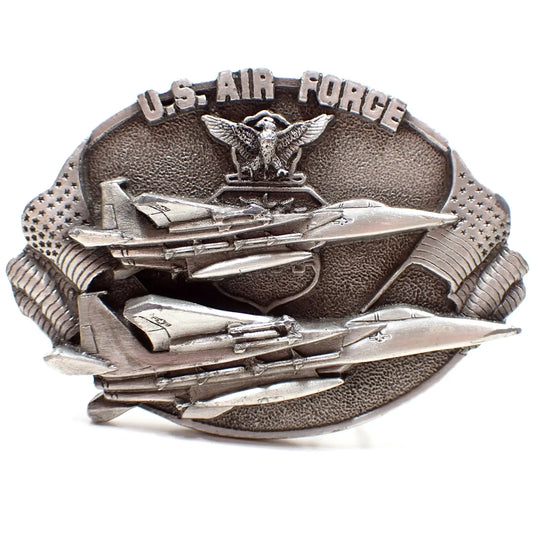 Front view of the retro vintage Bergamot Brass Works US Air Force belt buckle. It has an eagle, US flags, and two fighter jets on the front. The buckle is pewter and gray in color.