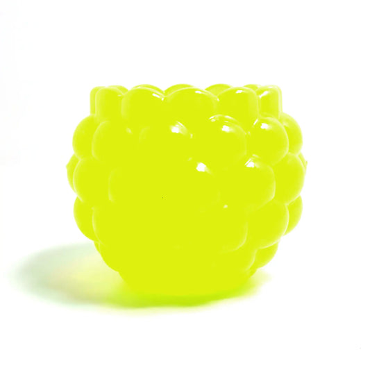 Side view of the handmade resin decorative bowl. The resin is bright neon yellow in color with a tint of bright green. It has a rounded shape with a bumpy round ball textured on the outside. The top tapers slightly and has a scalloped edge.