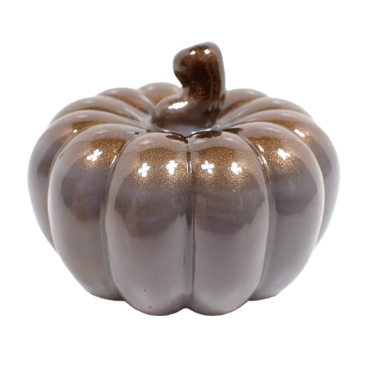 Side view of the handmade resin Fall pumpkin decor figurine. It has marbled shades of gray on the bottom and pearly dark brown resin on the top and stem.