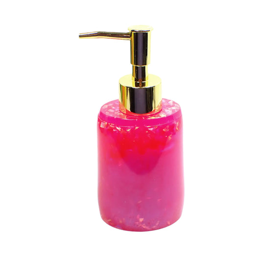 Side view of the handmade resin oval soap dispenser. The pump in the photo is gold color. The bottle part has bright neon pink and iridescent flakes towards the top and bright pearly pink resin towards the bottom.