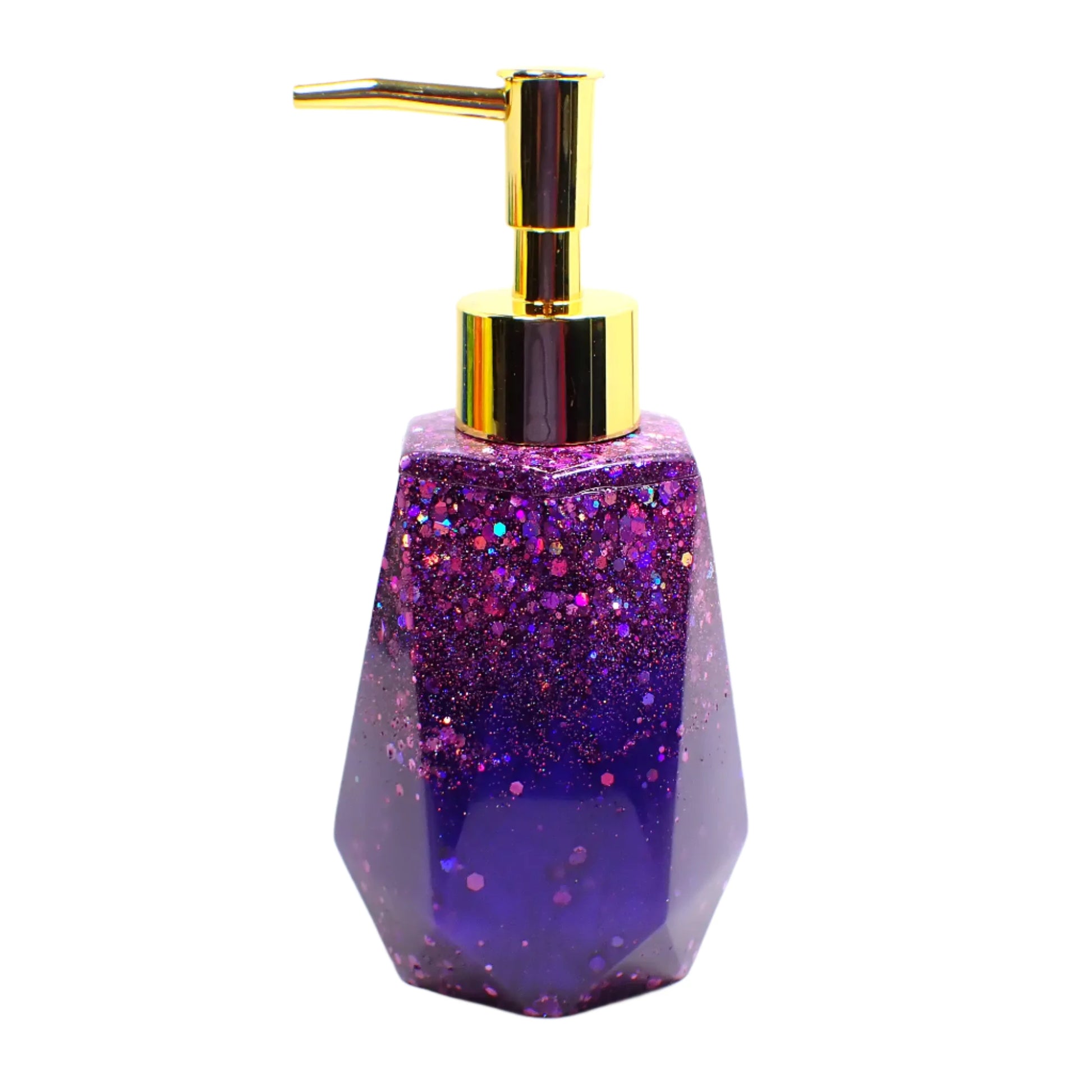 Side view of the handmade resin soap dispenser. This photo shows it with a gold color pump on top. The bottle part has dark pearly purple resin on the bottom and chunky iridescent purple glitter on top. It has a faceted shape with a flared out bottom.