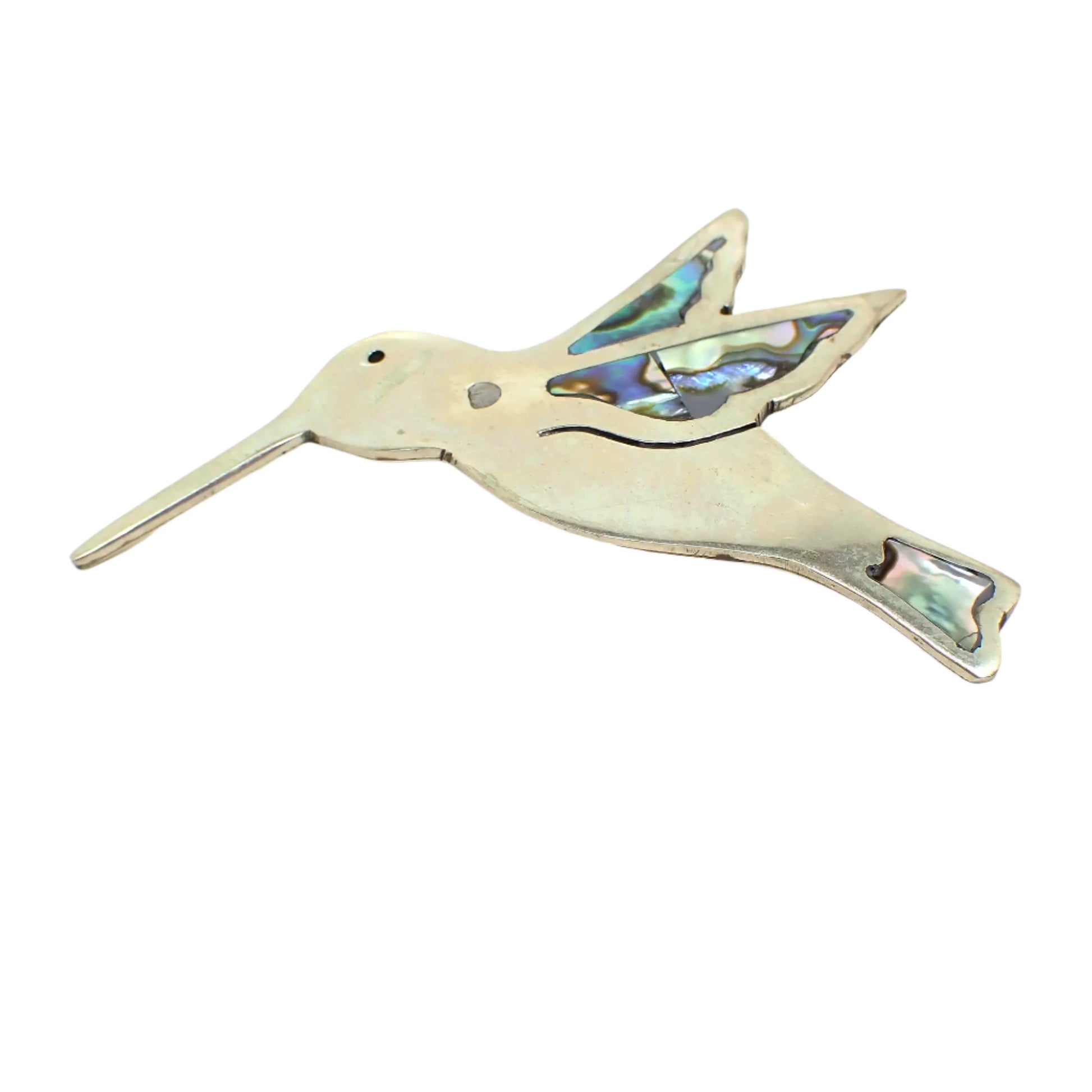 Angled view of the hummingbird brooch. This angle shows the side a little better so the thickness of the piece can be seen.