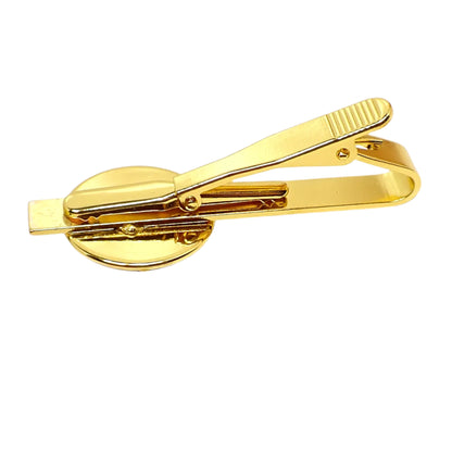 Photo showing the back of the tie clip. It has a hinged alligator clip style clip.