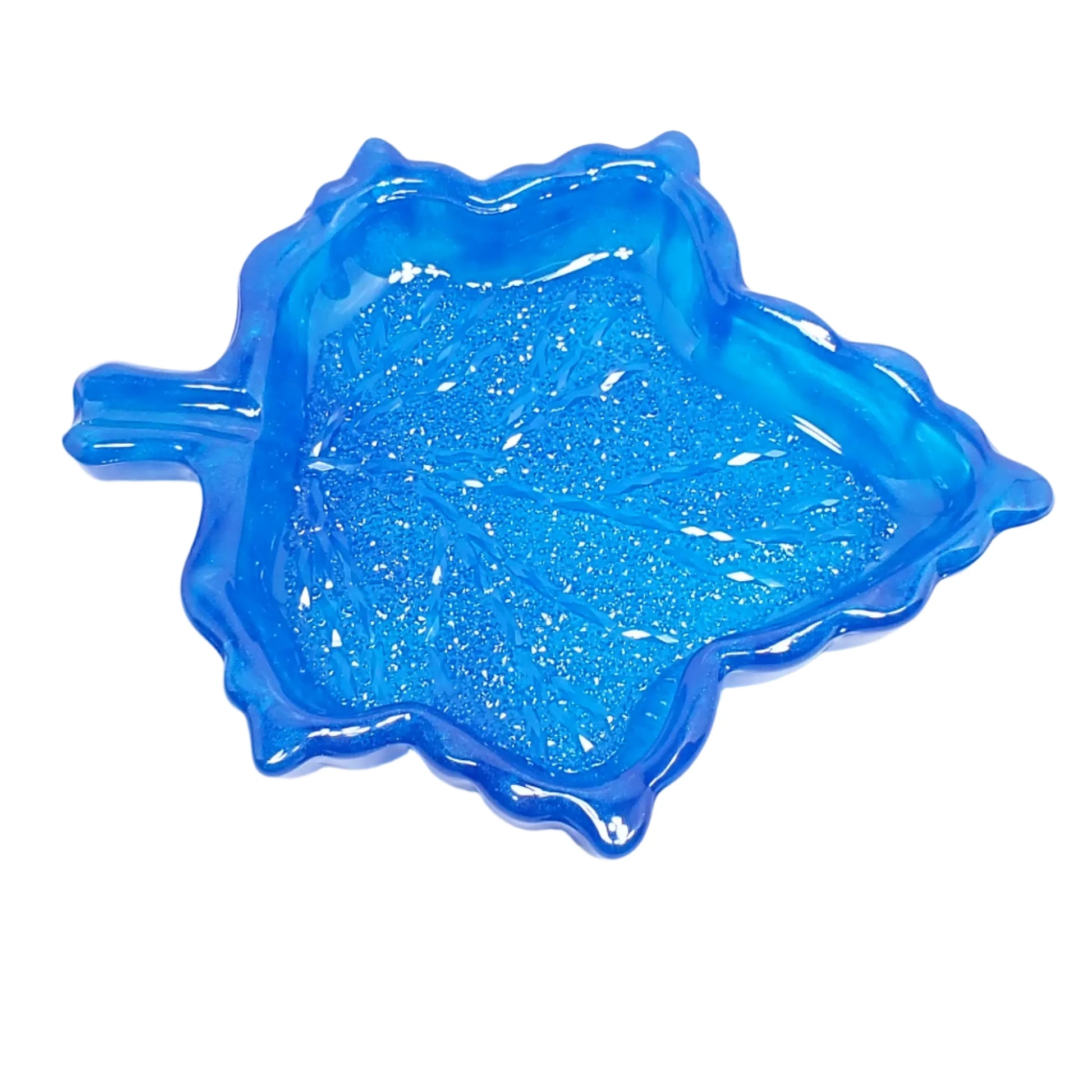 Top view of the blue leaf trinket dish so that more of the crystal like facets can be seen on the inside bottom area of the dish.