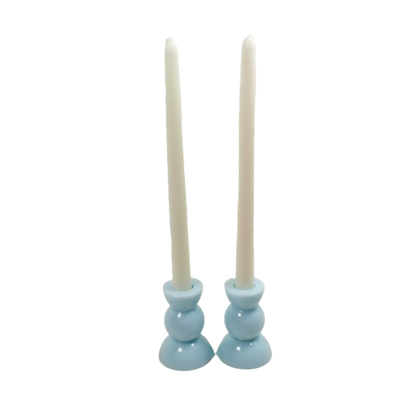 Photo of the candle holders holding taper candles.