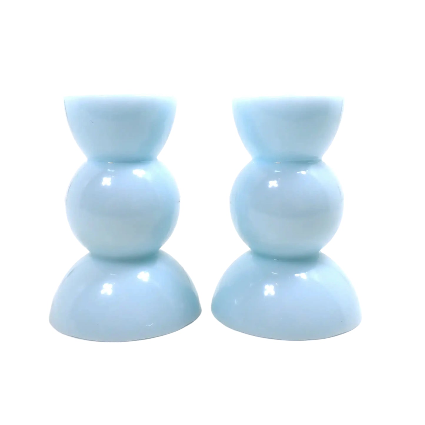 Side view of the handmade candle holders showing a close up of the cotton candy blue color.