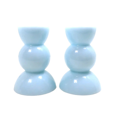 Side view of the handmade candle holders showing a close up of the cotton candy blue color.