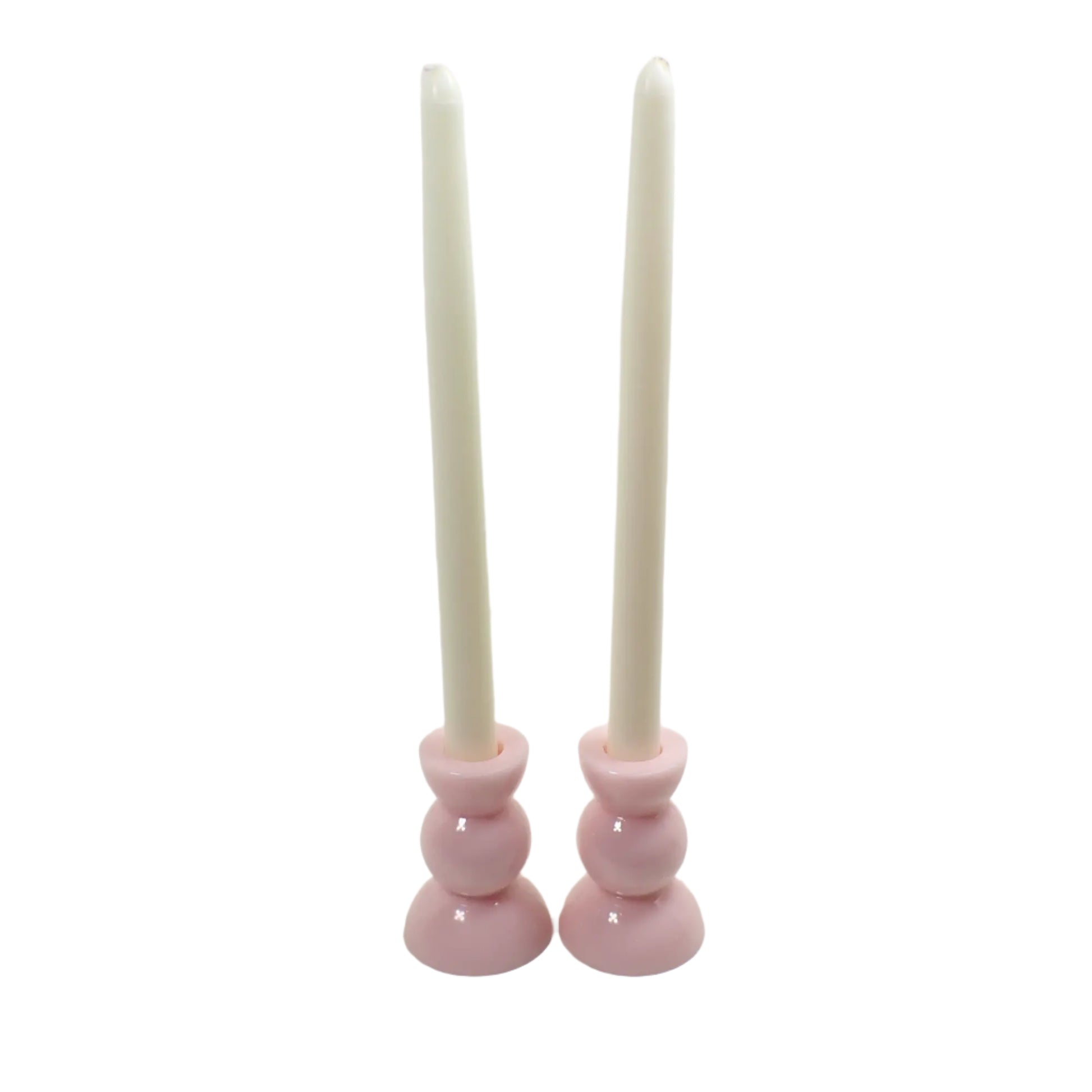 Photo showing how the resin candle holders will look with taper candlesticks in them.