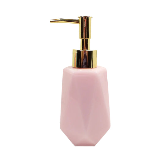 Side view of the handmade resin soap dispenser. The resin is an opaque light cotton candy pink color. There is a metallic gold color plastic pump on top in the photo.