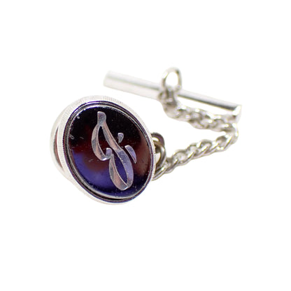 Full view of the vintage initial letter J tie tack. Here the bar and chain attached to the back clutch can be seen.