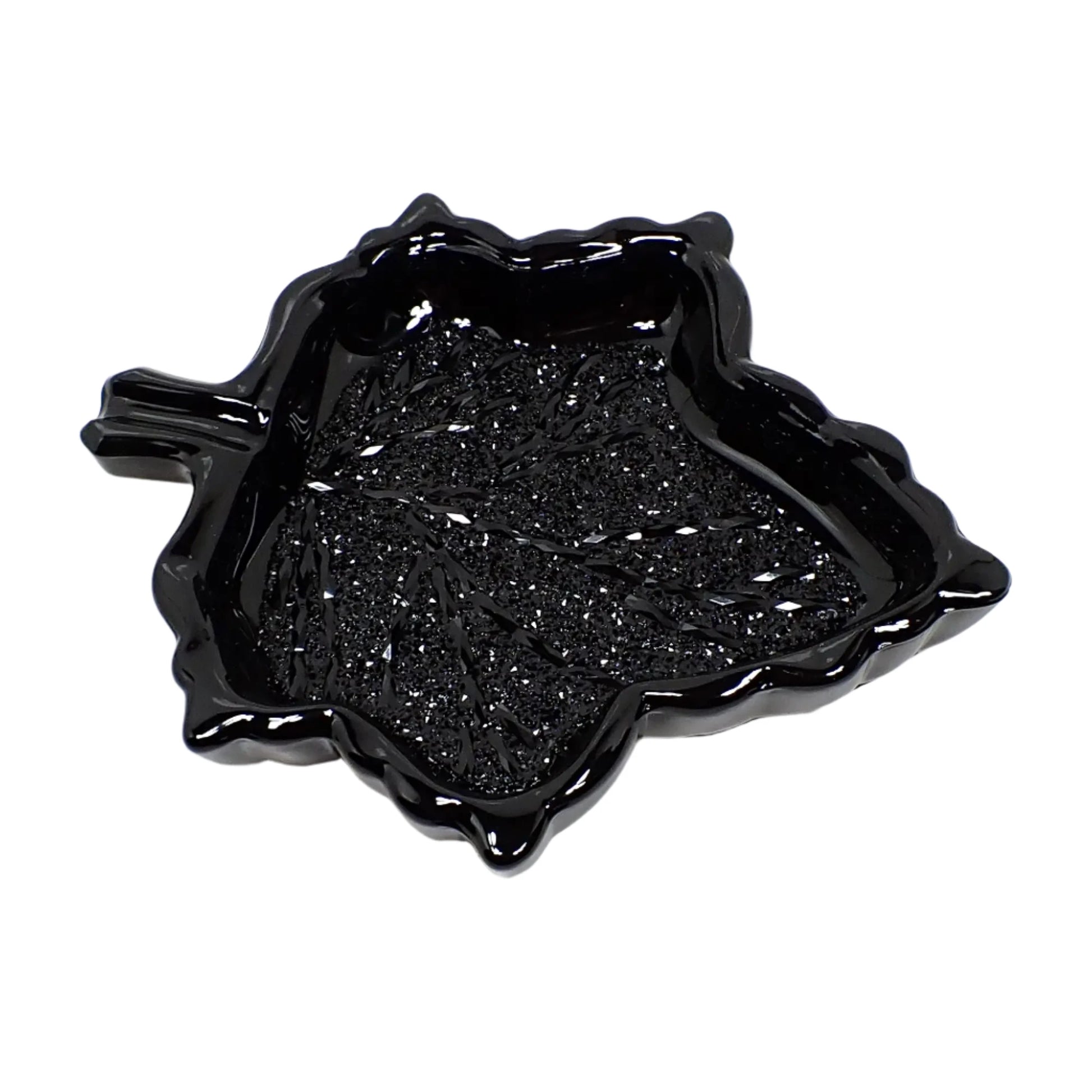 Another photo of the handmade resin Halloween Goth trinket dish. It has shiny black resin and a sparkly inside bottom area.