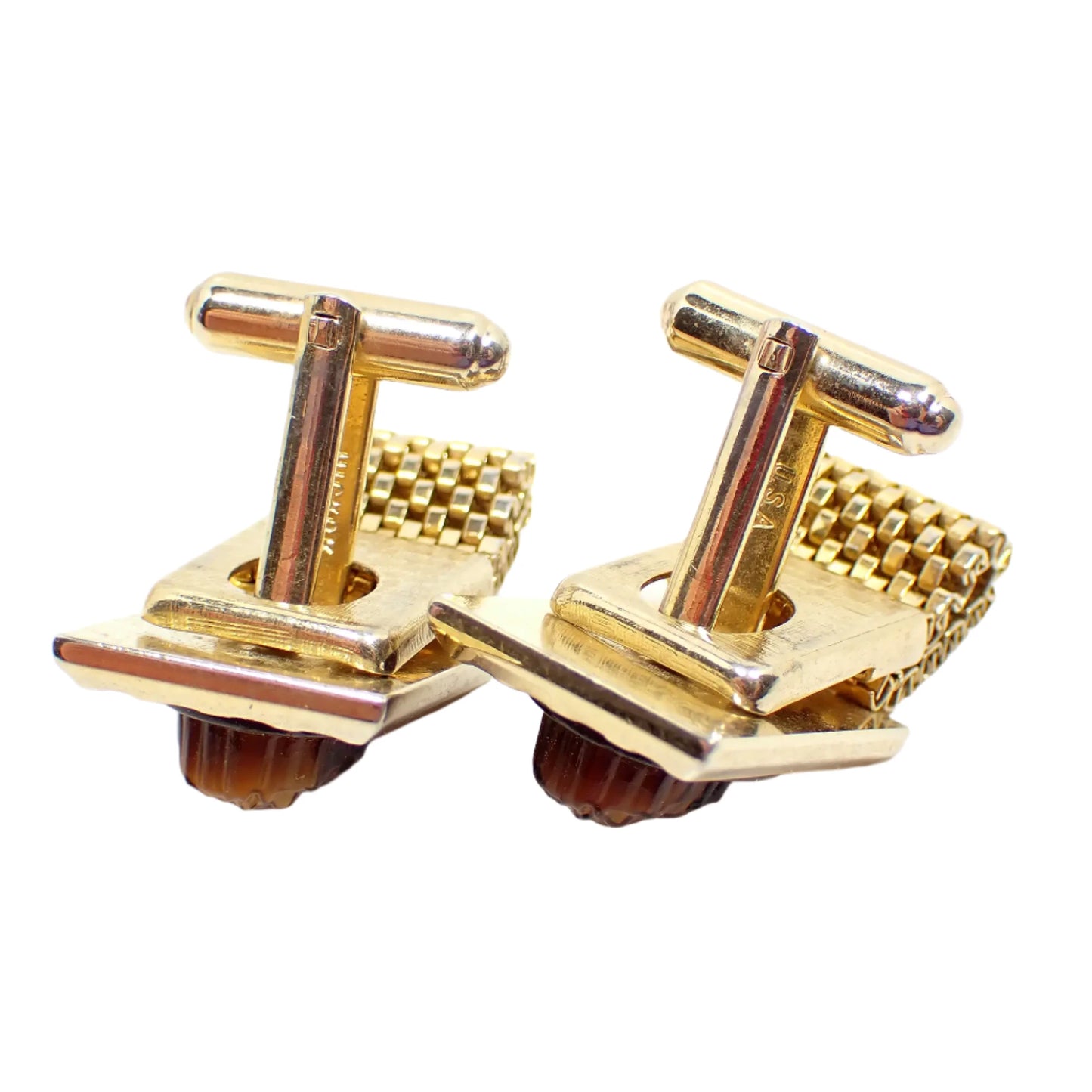 Photo of the back side of the Hickok wrap around cameo cufflinks. Here it can be seen where the mesh band goes over the levers. Part of the markings for Hickok and USA can also be seen.