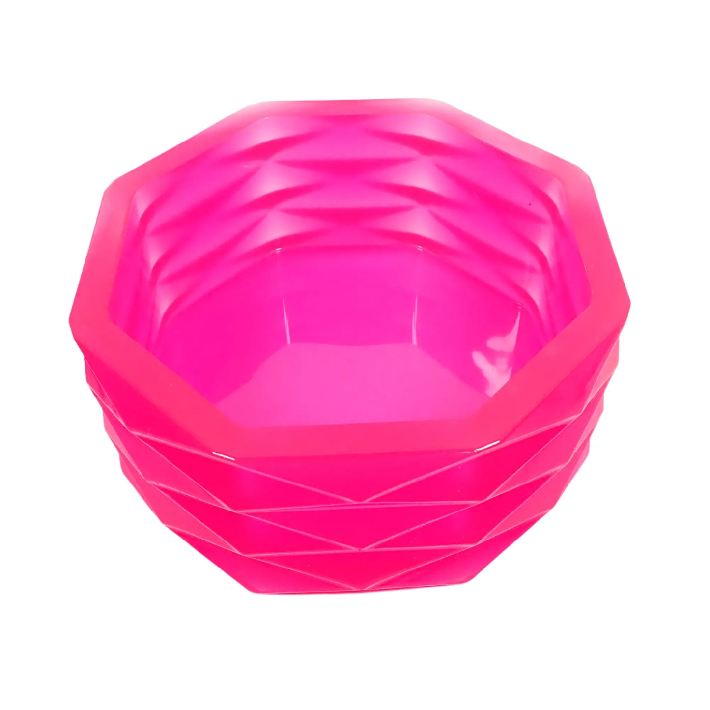 Angled top view of the large handmade neon pink resin geometric bowl showing more of the inside area where objects could be placed. The resin is shiny and semi translucent in a bright neon pink color. The inside is smooth.