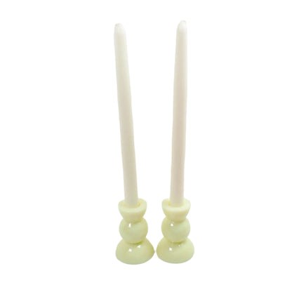 Photo showing how the candle holders look with taper candles in them. 