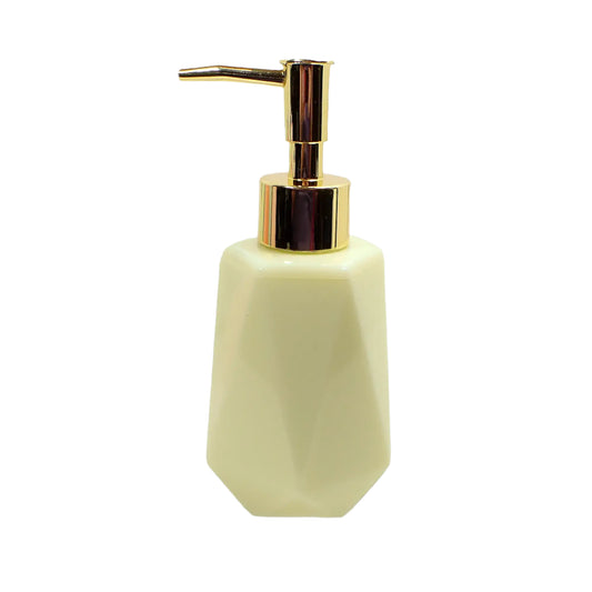 Side view of the handmade soap dispenser. The resin is a very light yellow lemon cream color. There is a metallic gold color plastic pump on top showing in the photo.