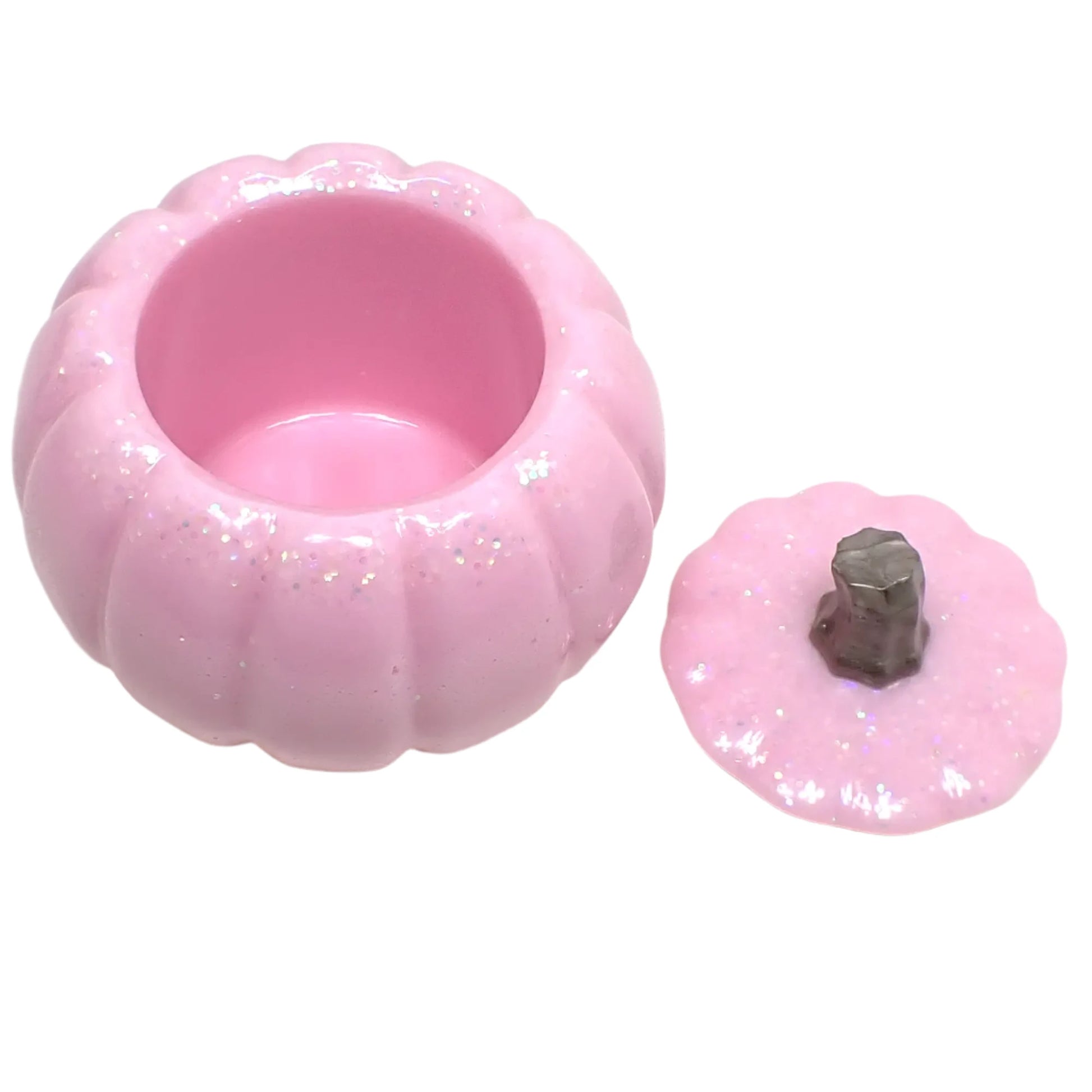 Photo of the light pink glitter resin pumpkin trinket box with the lid off so the inside storage area can be seen.