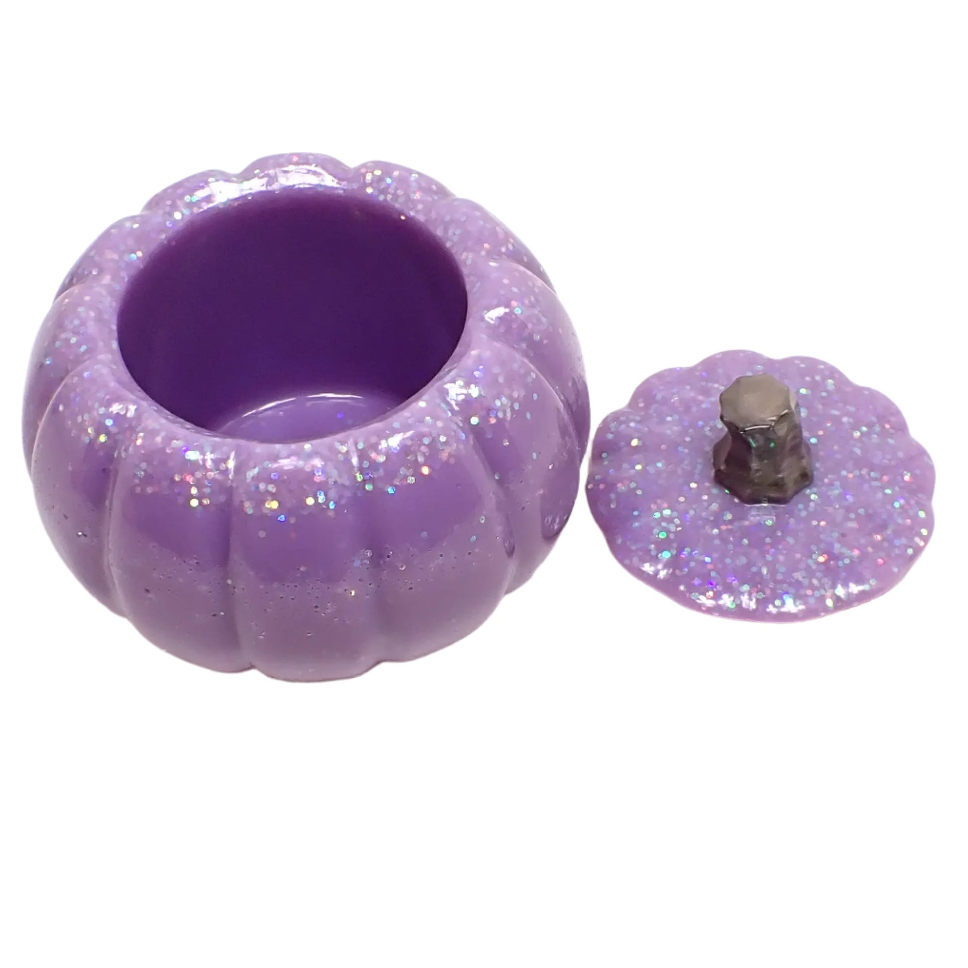 Photo of the light purple pumpkin trinket box with the lid off showing the area inside where items can be placed. 