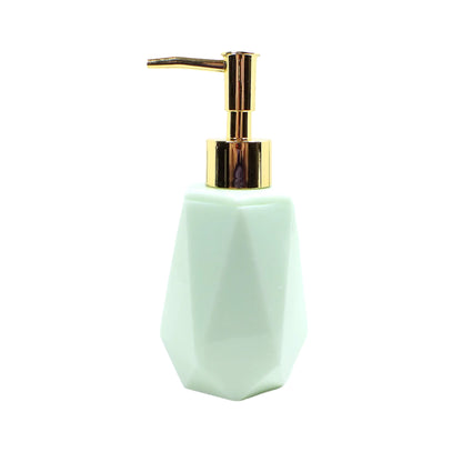 Another side view of the handmade faceted soap dispenser. The photo shows a metallic gold color plastic pump on top.