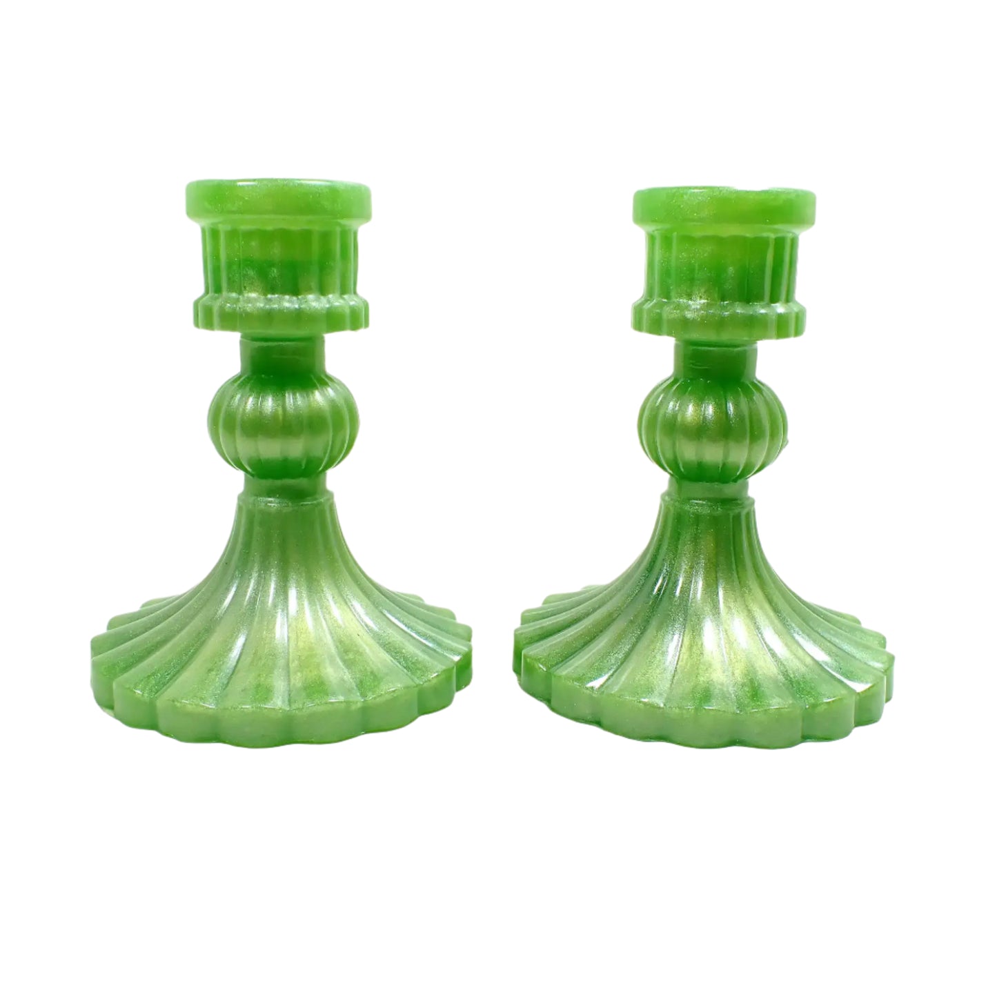 Side view of the handmade vintage style resin candle holders. The resin is a pearly lime green in color.