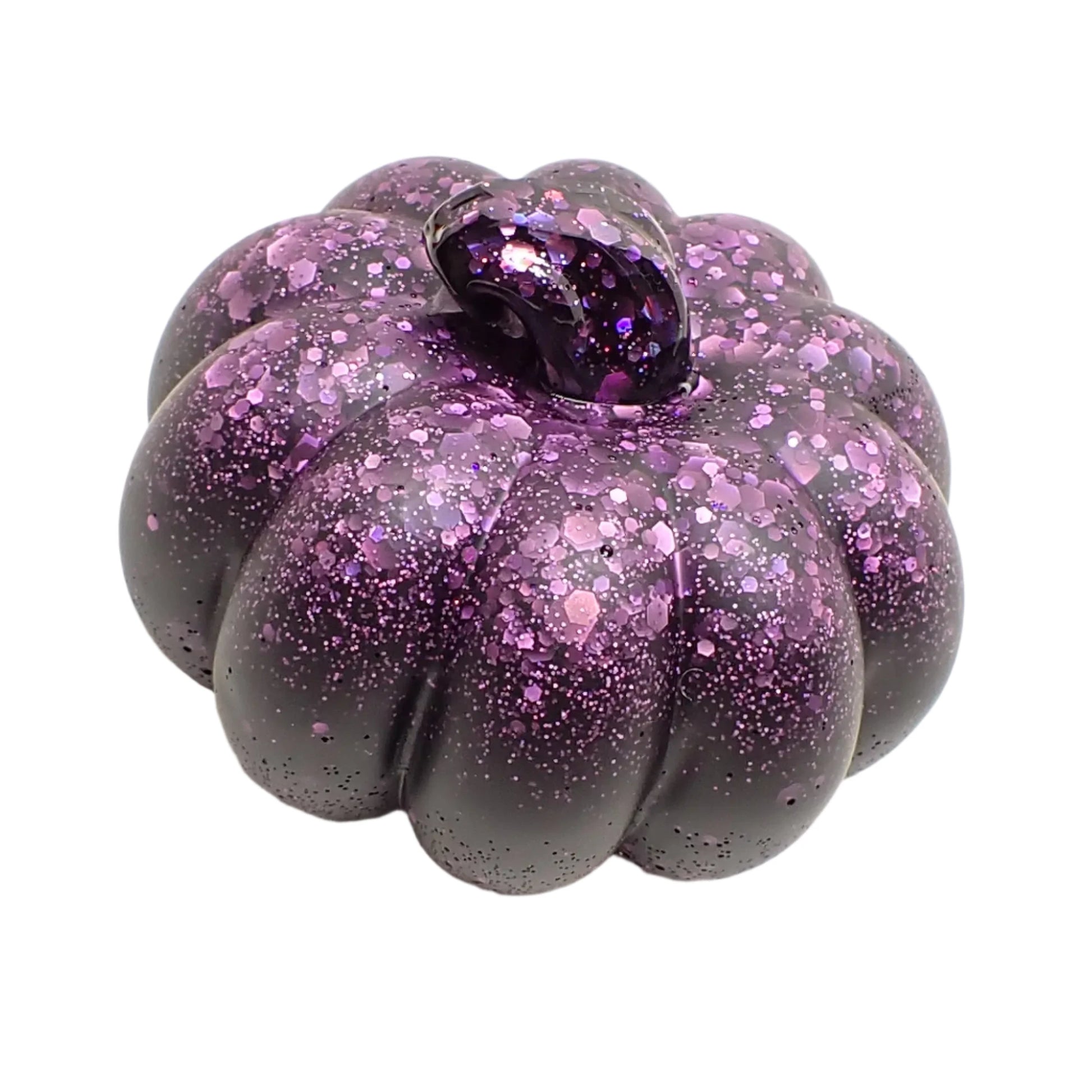 Angled top view of the pumpkin to show the muted iridescence of the glitter in the matte resin.