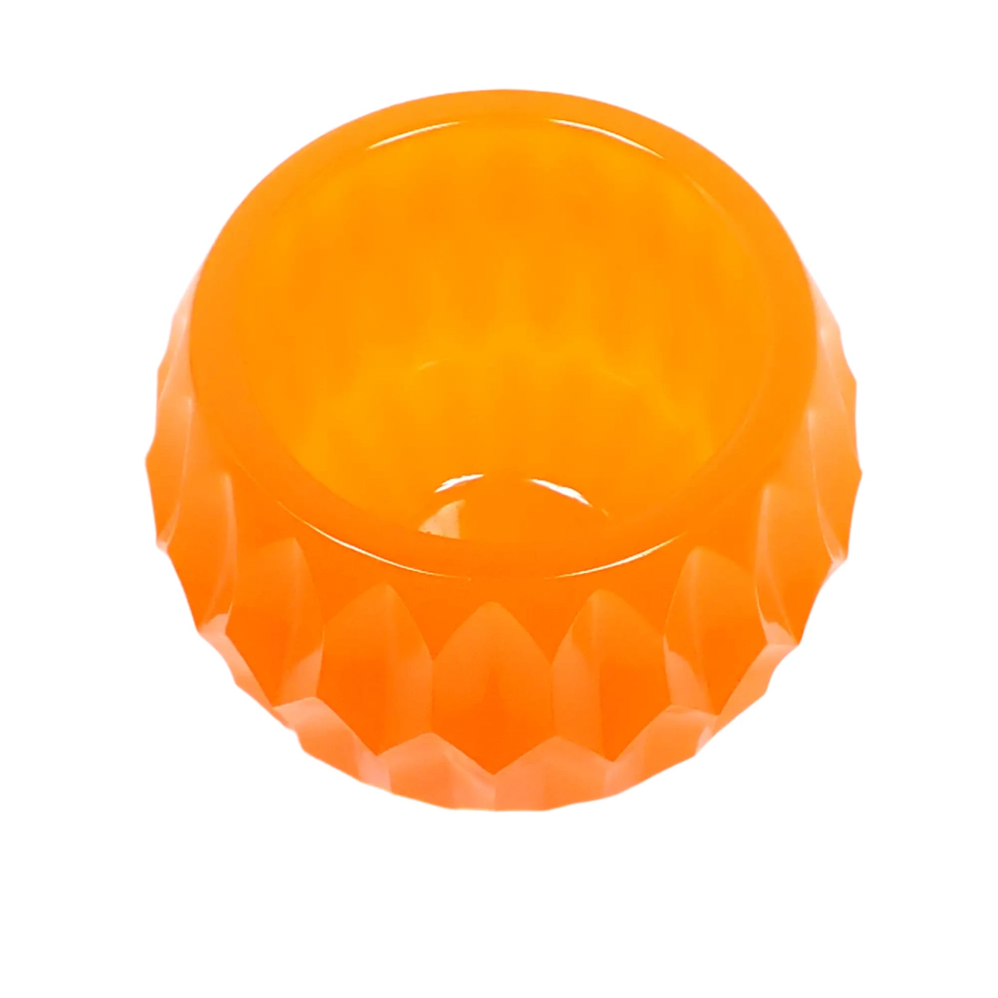 Angled top view of the neon orange bowl with hexagon pattern showing the round opening at the top.