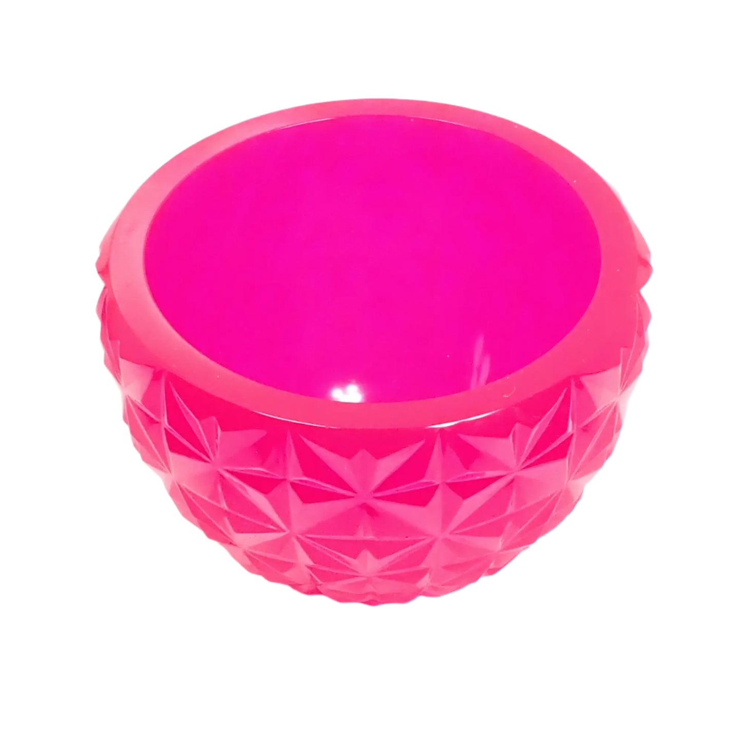 Photo of the handmade neon pink resin faceted bowl showing more of the top opening where you could put succulents or other small objects.