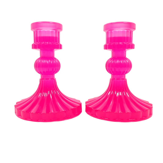 Set of two handmade bright neon pink taper candlestick holders. The resin is shiny and semi translucent in a bright neon pink color. The candle holders have a vintage style look with fluted sides and flared bottoms. Great for adding a pop of color to your home decor.
