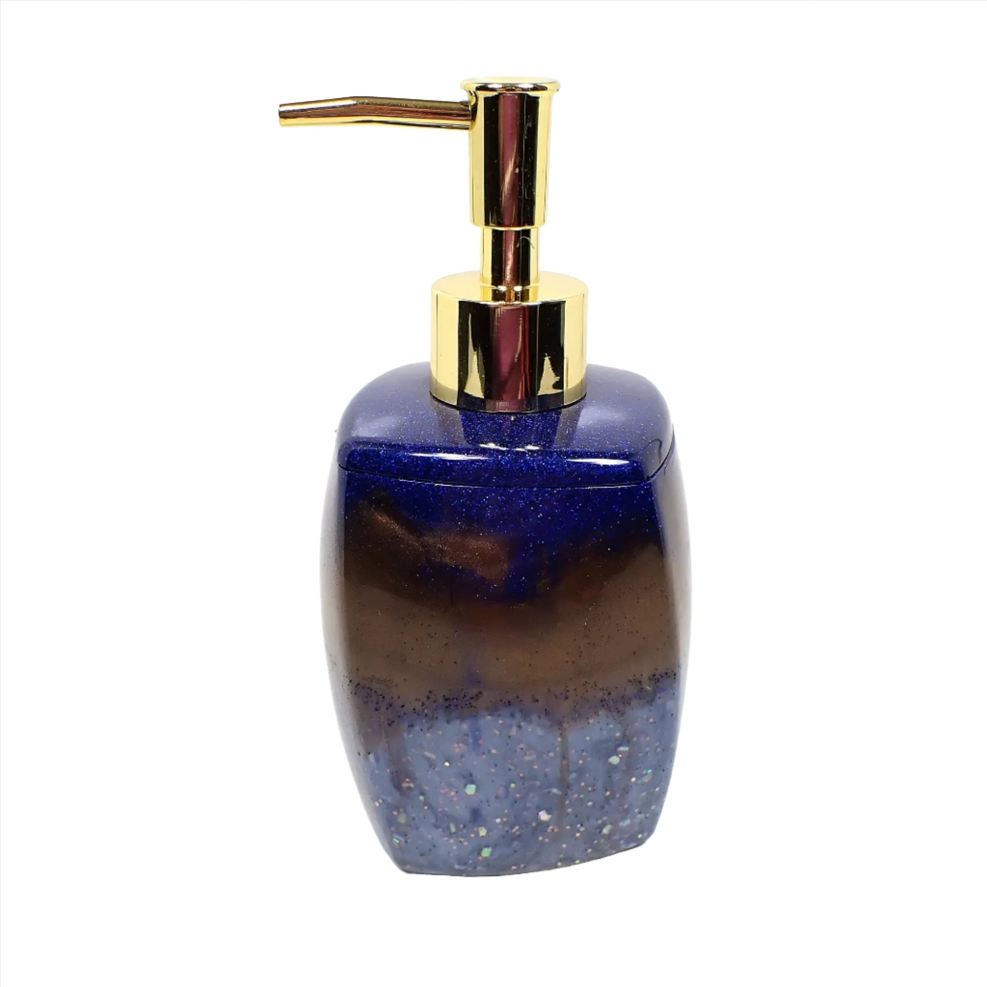 Side view of the handmade resin and glitter soap dispenser. It has a large rounded square design with a light twist to it. There is a gold tone metallic plastic pump style top. The top has pearly dark blue resin with tiny flecks of sparkling blue glitter, the middle area has swirls of pearly dark brown resin, and the bottom has pearly light blue resin with chunky iridescent glitter.