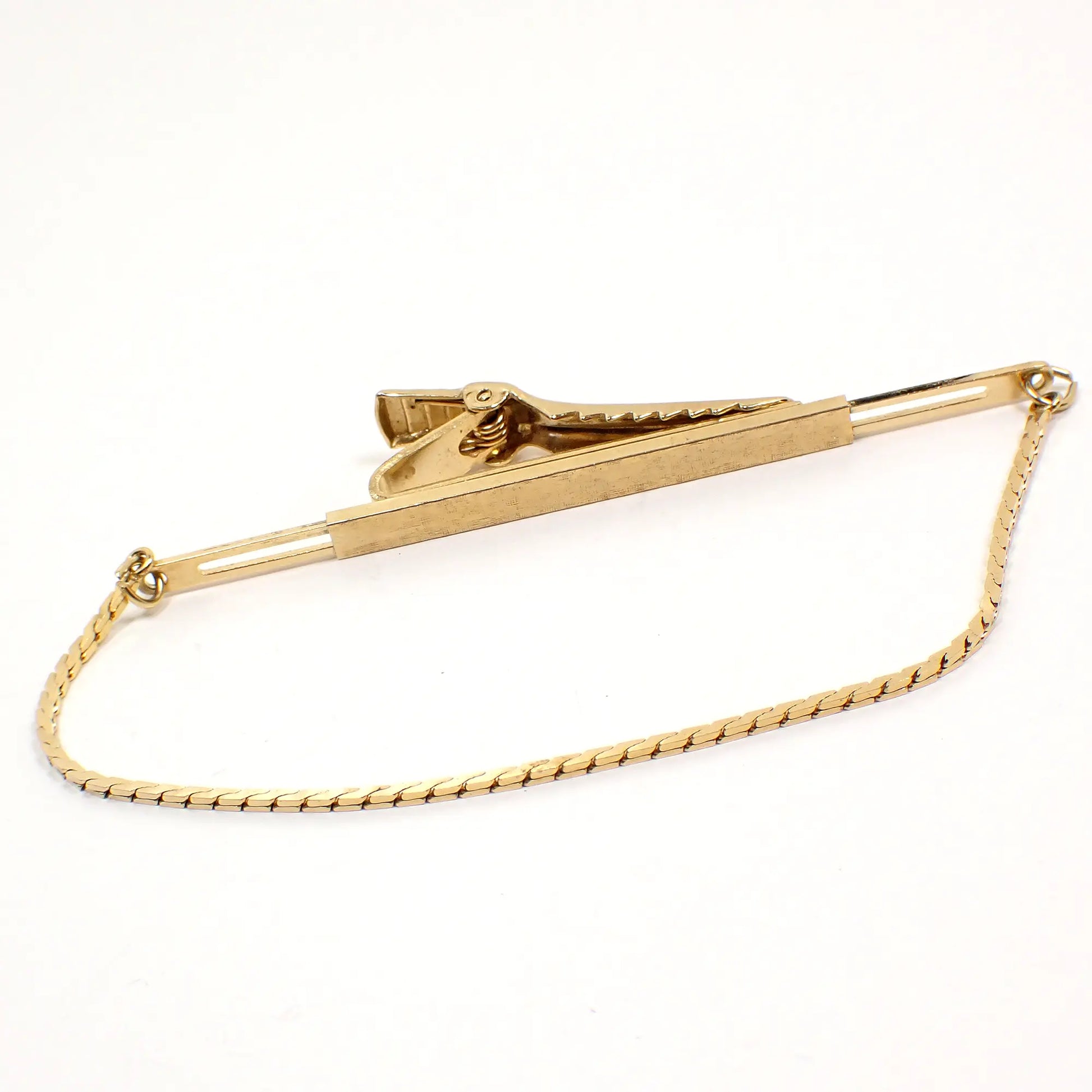 View of the Anson Mid Century vintage tie chain clip clasp with both sides slid all the way out to show the adjustable sides.