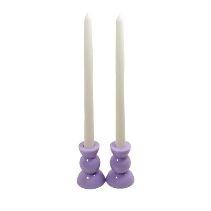 Photo showing the candle holders with taper candles in them for display.