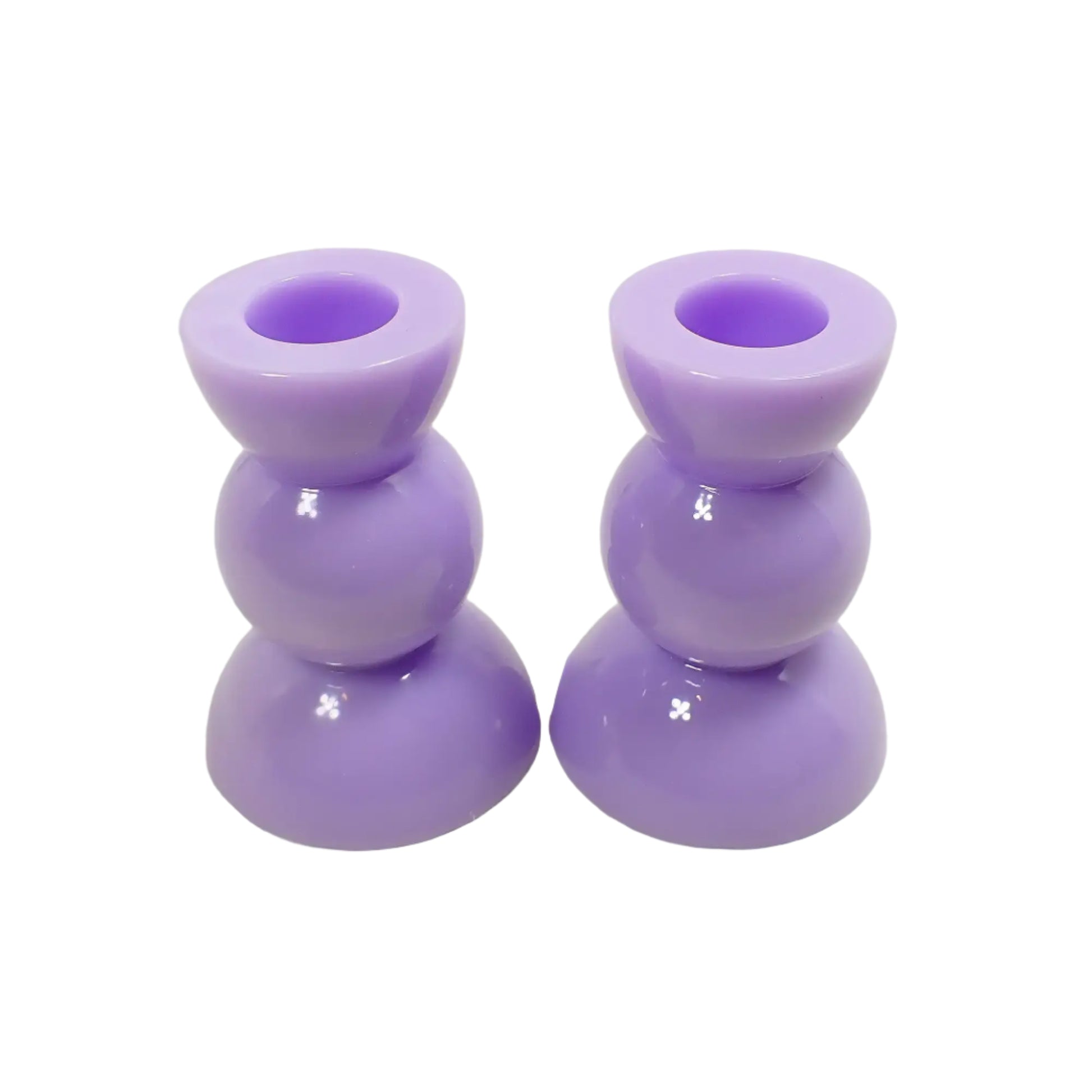 Angled view of the pastel purple candle holders showing more of the top area where the opening for the candles are.