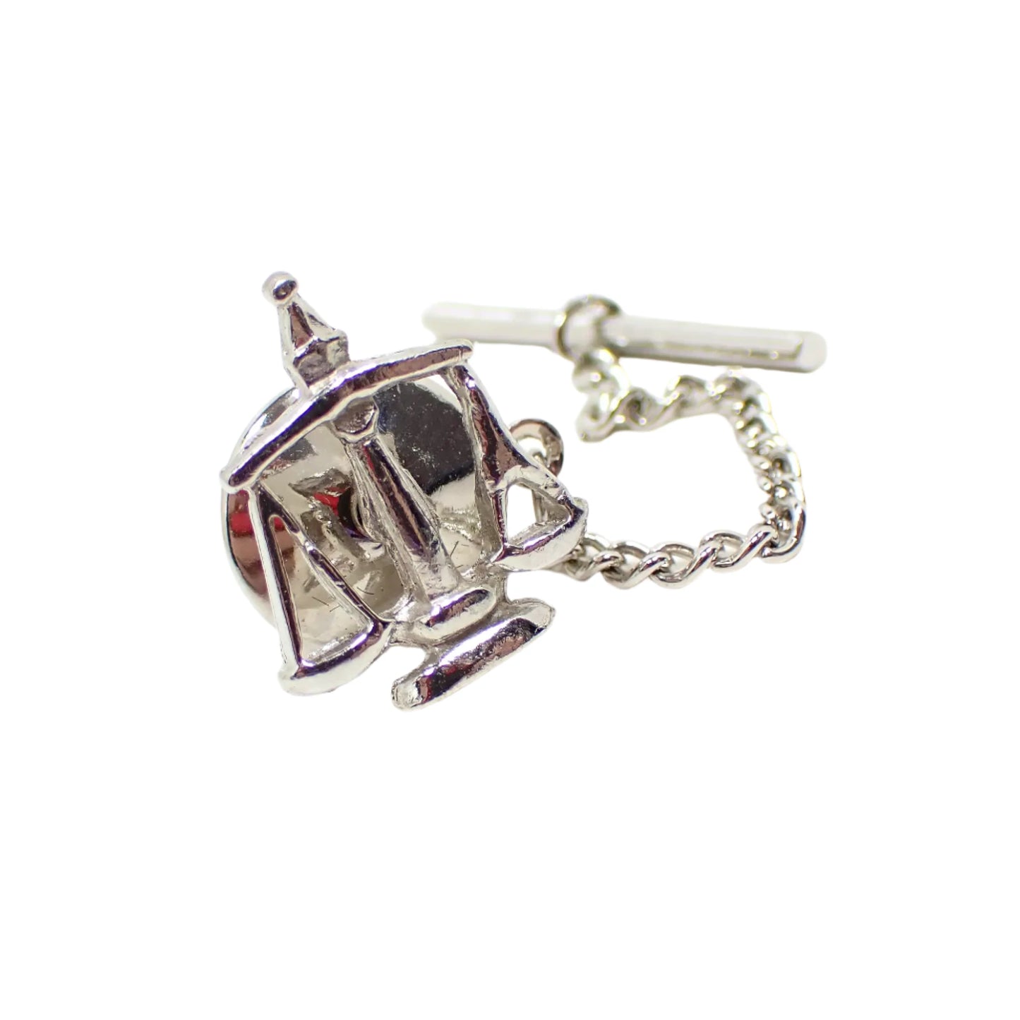 Full view of the vintage Scales of Justice tie tack. The chain attached to the back clutch can be seen in this photo.