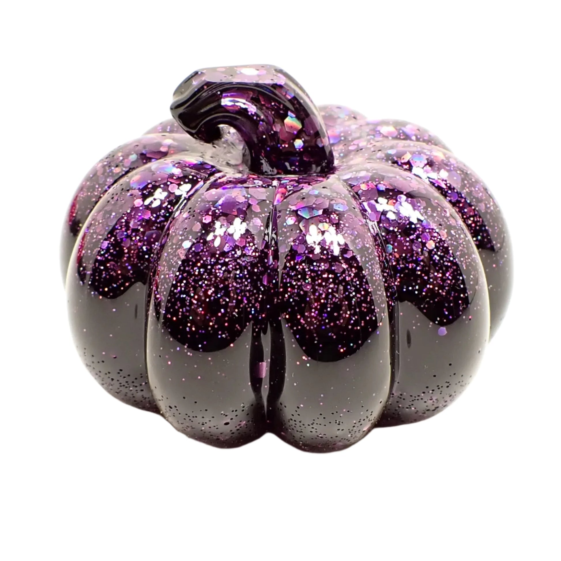 Side view of the small pumpkin showing where the black resin and purple glitter meet.