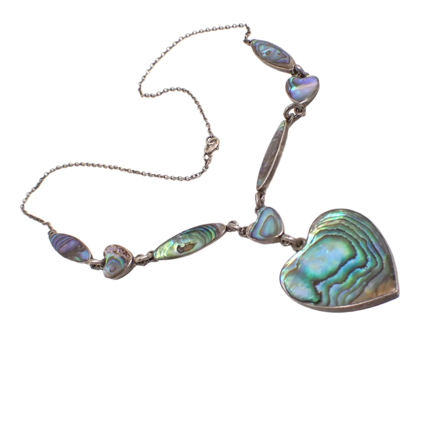 Angled view of the necklace showing the side edges better. The abalone is showing mostly shades of blue, green, and purple.