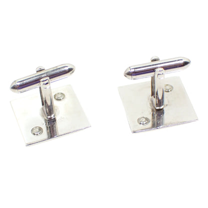 Photo of the backs of the Swank initial letter T cufflinks. Here you can see Swank stamped on the backs of the cuff links.