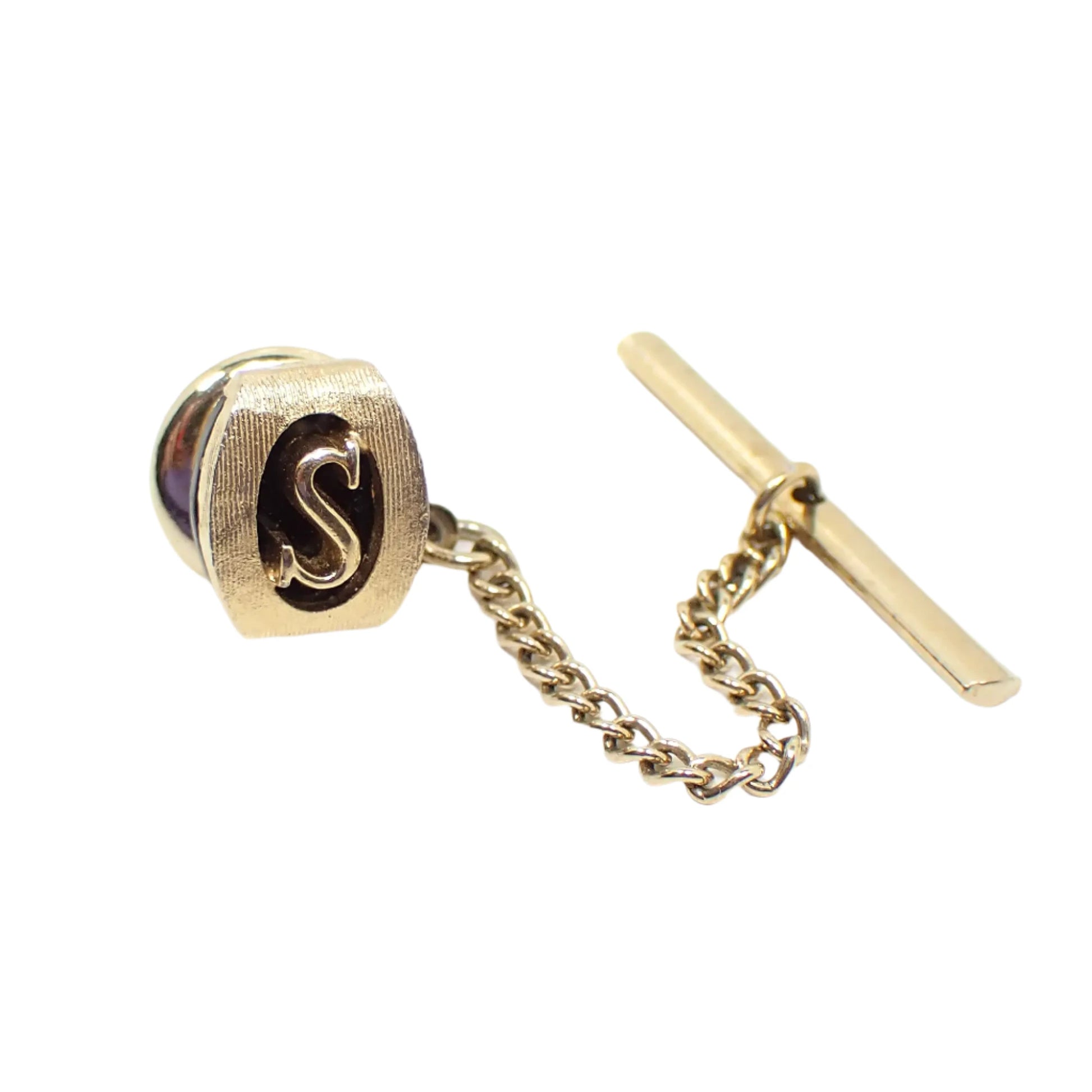 Full view of the tie tack showing the bar and chain that comes off the clutch on the back.