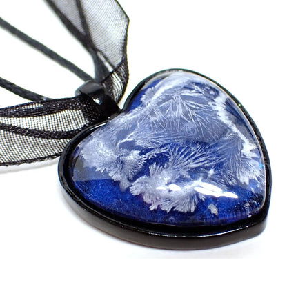 Enlarged photo of the Crystalline choice of style that has more white frost crystal like structure through the pendant.