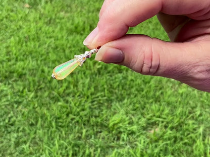 Small Silver Plated Handmade Yellow Glitter Lucite Teardrop Earrings video showing how the glitter sparkles in the light.