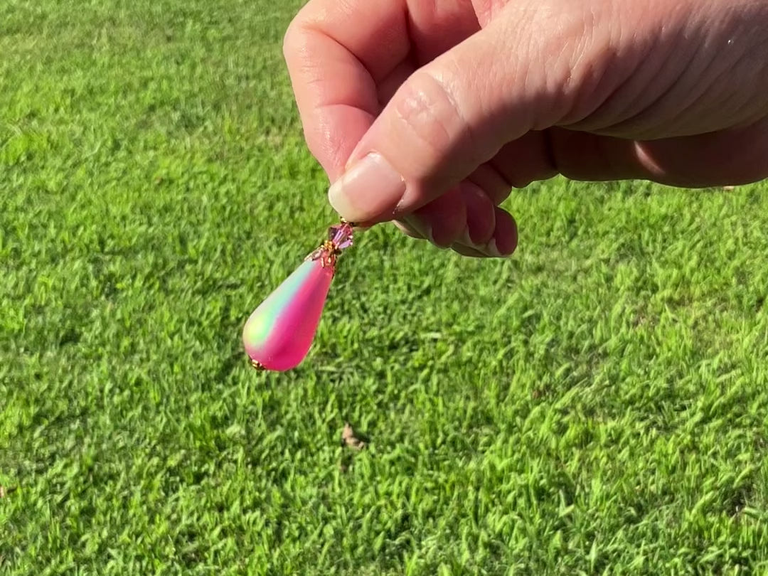 Large Frosted Pink Handmade Teardrop Earrings video showing how the AB sheen looks when the light hits it.